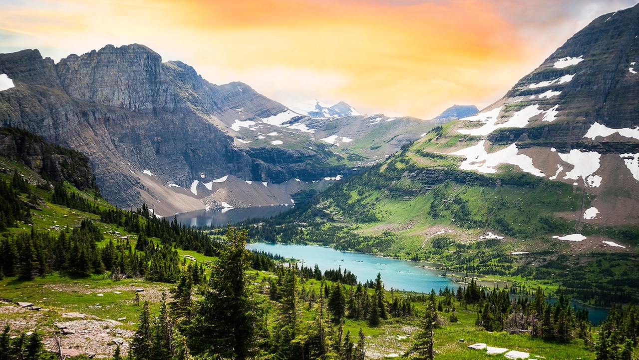 View of mountains and lake at Glacier National Park in Montana