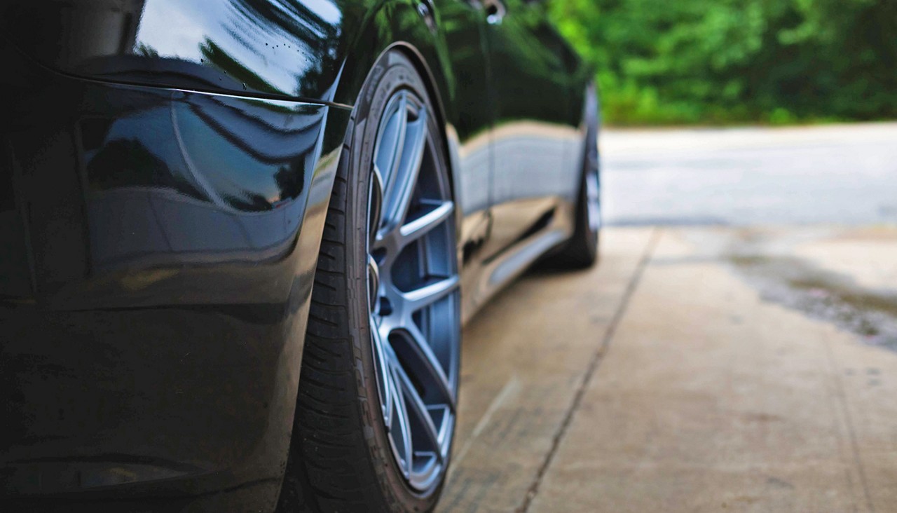 Back view of tires on a black car