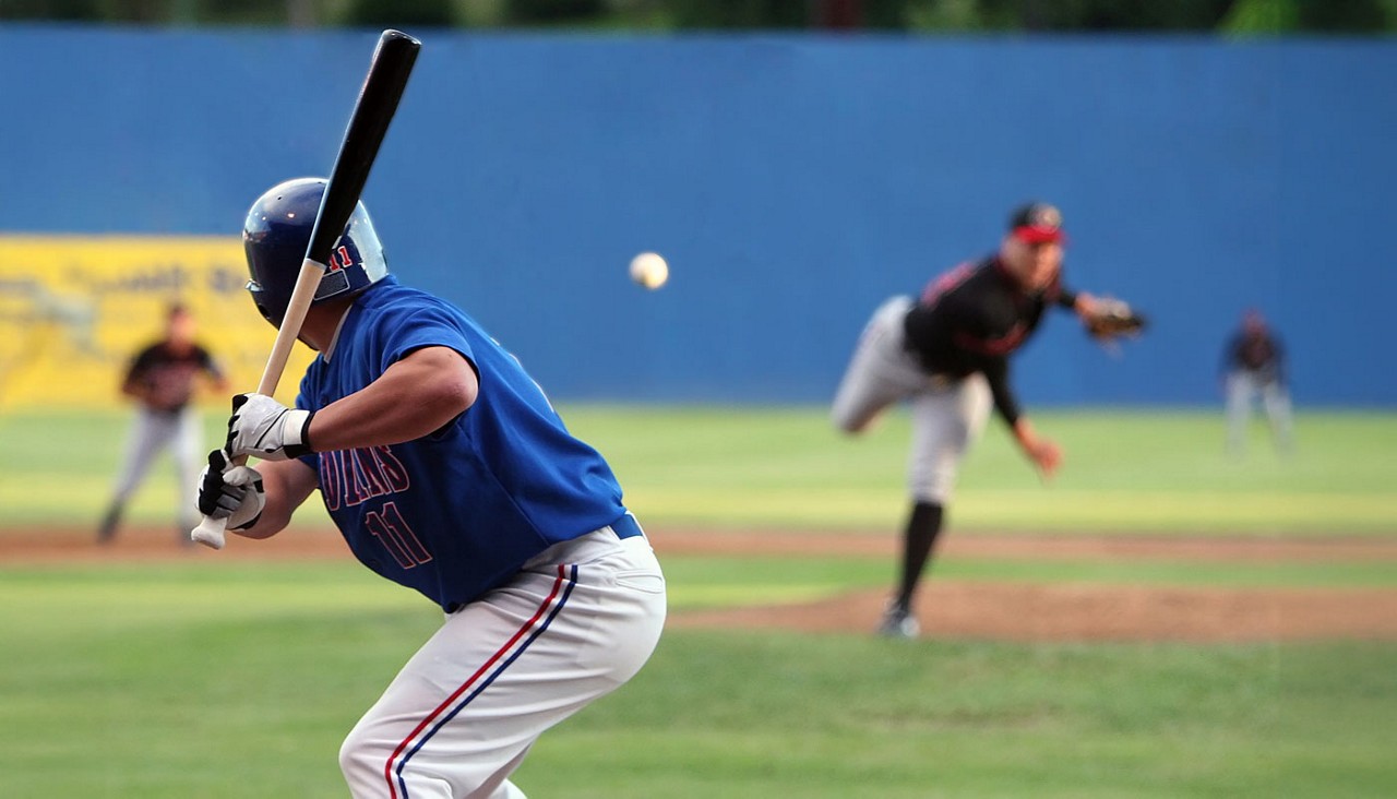 Baseball player ready to hit the ball being pitched